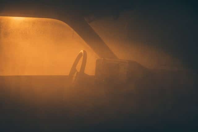 Interior of a vehicle at night, a prime time for cockroach activity.