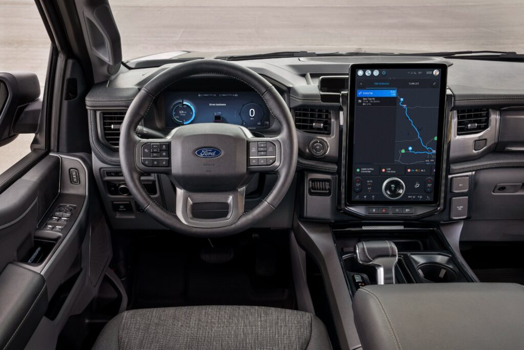 Close-up view of the F-150 Lightning Flash interior, highlighting its sleek 15.5-inch LCD Capacitive Touchscreen display, integrated into the dashboard.